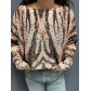 Top pull oversize imprimé leopards stylisés