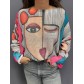 Top pull oversize imprimé visage clin d'oeil