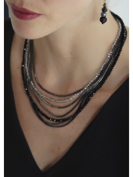 Necklace - Multi row faceted beads and various chains.