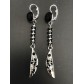 Earrings - Resin stone with pendant metallic feather with dots.