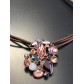 Collier - Grappe de pierres sur multicordons cuir.