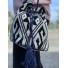 Cross body bag - Fabric style with ethnic embroided pattern with tightening lace and pom poms.