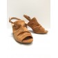 Sandals - Plain color perforated suede style with high heels.