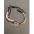 Bracelet - Sliding style multi row with metallic rings charms.