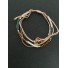 Bracelet - Sliding style multi row with metallic rings charms.