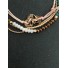 Bracelet - Sliding style multi row with metallic rings charms.