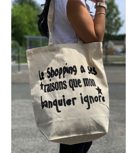 Sac porté épaule tote bag "le shopping a ses raisons que mon banquier"