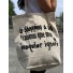 Sac porté épaule tote bag "le shopping a ses raisons que mon banquier"