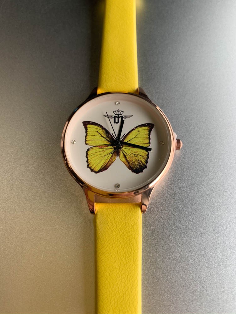 Montre - Bracelet fin papillon au fond du cadran