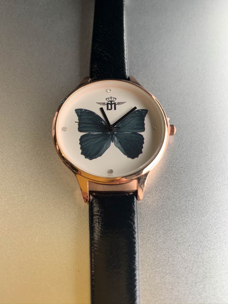 Montre - Bracelet fin papillon au fond du cadran