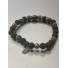 Bracelet - Rang perles façon pierre avec anneaux et pastille araignées