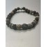 Bracelet - Rang perles façon pierre avec anneaux et pastille araignées