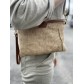 Pochette en jute garnie cuir avec anse ajustable 