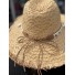 Chapeau forme panama en raphia avec bande coquillages et pompons 