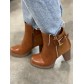 Bottines plateforme avec derrière façon daim et large boucle côté