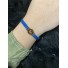 Bracelet Acier- monté sur elastique avec rond \"love\"