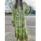 Robe longue manches longues col mao boutonné resserrée à la taille