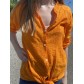 Chemise fine effet gauffré unie avec noeud sur le devant