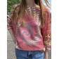 Top pull oversize imprimé ronds en spirales