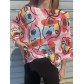 Top pull oversize imprimé multi visages avec clin d'oeil