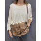 Sac porté travers style craquelé brillant, poche avant et anneaux