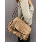 Sac porté travers poches avant et rabat style craquelé brillant
