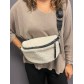 Sac synthé en tissu style mouton forme petite  banane.