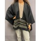 Poncho avec lurex et bandes avec ronds et losanges 